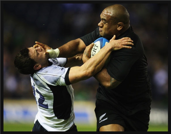 An All Black crushes some hapless opponent (photo from nzherald.co.nz)